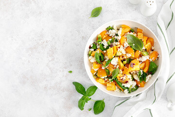 Yellow tomato salad with green paprika, cottage cheese and basil. Healthy food, diet. Top view