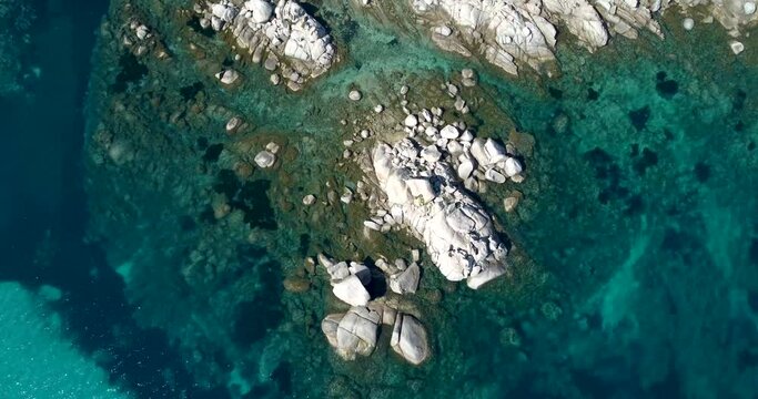 Top down aerial view of Palombaggia beach in Corsica, close to Porto Vecchio - Vue a&eacute;rienne de la plage de Palombaggia en Corse, proche de porto vecchio