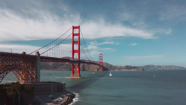 San Francisco Golden Gate Bridge daytime with sail boat. California, USA