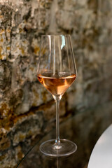 Tasting of brut champagne sparkling wine produced by traditional method in underground caves