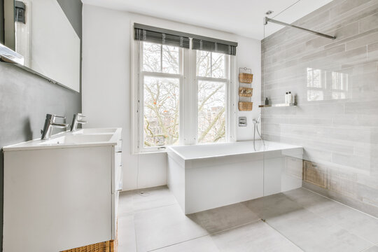 Sunlit modern bathroom with window