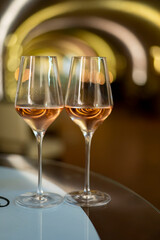 Tasting of brut champagne sparkling wine produced by traditional method in underground caves