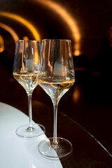 Tasting of brut champagne sparkling wine produced by traditional method in underground caves
