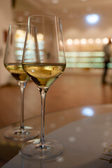 Tasting of brut champagne sparkling wine produced by traditional method in underground caves