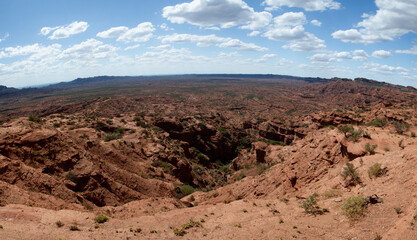 The arid desert. Panorama view of the red sandstone and rocky cliffs in Sierra de las Quijadas canyon.