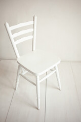 wooden chair on a wall