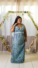young plus size caucasian brazilian bride at her wedding with decorated background, makeup and hairstyle.