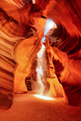 ancient ghost into a shaft of light of the canyon Antelope near Page Arizona. Navajo religion and beauty of nature concept. © emotionpicture