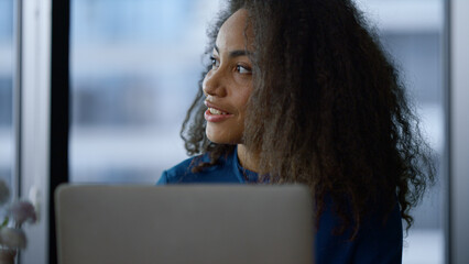 African american ceo woman enjoy working laptop drink morning coffee in office.