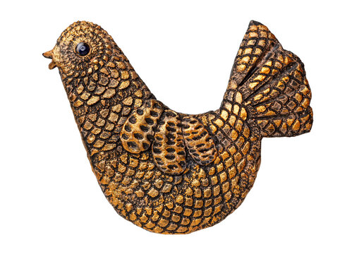 Decorative, textured ceramic bird of golden color