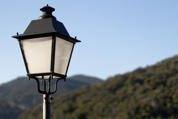 Single streetlight during the day