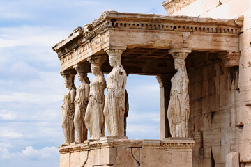 Detail of Caryatid Porch on the Acropolis in Athens, Greece. Ancient Erechtheion or Erechtheum temple. World famous landmark at the Acropolis Hill.