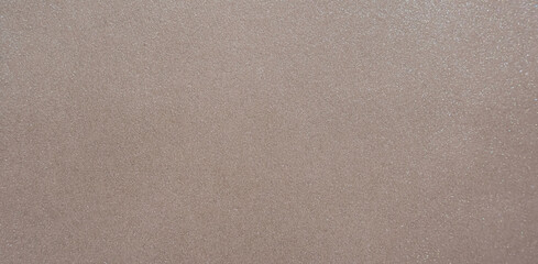 Fototapeta na wymiar Abstract brown paper texture background. A little glitter