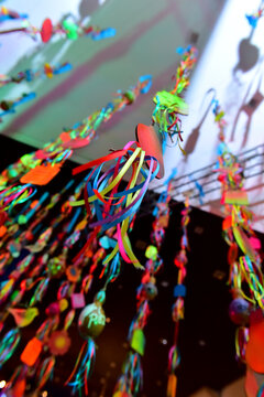 Decoration With Mobiles Hanging From The Ceiling
