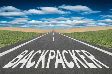 Obraz premium Backpacker text on road to a new adventure.