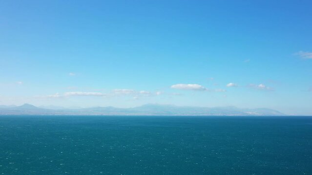 The sublime Ionian Sea in Europe, Greece, the Peloponnese, towards Corinth, in summer, on a sunny day.