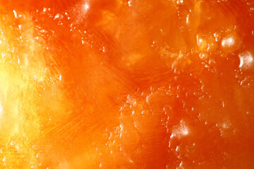 Macro texture of orange juice or orange sorbet