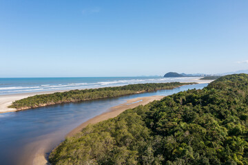 Aerial image of the meeting between Rio and the Sea. Environmental reserve, beautiful and empty beach