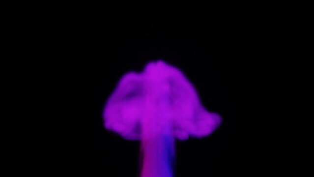 fiusha colored smoke mushroom rising