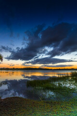 Obraz premium Colorful Sunset over Lake Zobel, George LeStrange Preserve, Fort Pierce, Florida