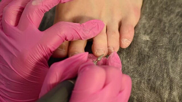 The master makes hardware pedicures to the client. 