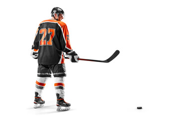 Hockey. Sport concept. Professional hockey player isolated on white background. Athlete. View from behind