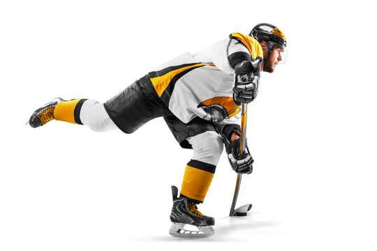 Athlete in action. Professional hockey player in the helmet and gloves on white background. Sports emotions. Hockey athlete with desire to win and be champion
