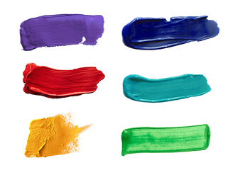 Naklejka premium Multi-colored brushes isolated on a white background.
