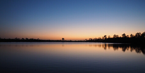 Twilight over Pine Glades Lake in Everglades National Park, Florida on calm clear April evening.