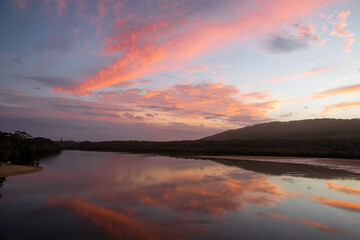 Cloud Reflections in River at Sunset