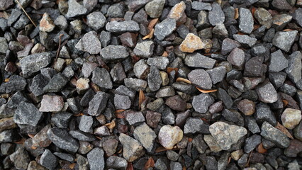 pile of pebbles rock used as garden decoration