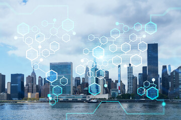 New York City skyline, United Nation headquarters over the East River, Manhattan, Midtown at day time, NYC, USA. Decentralized economy. Blockchain, cryptography and cryptocurrency concept, hologram