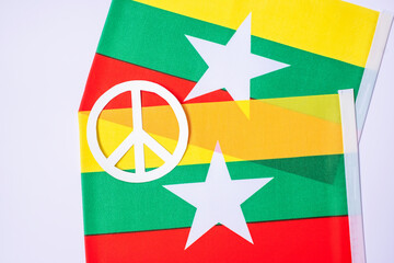Support for Myanmar people, peace dove with flag of Myanmar. Freedom, stop war, dictatorship and...