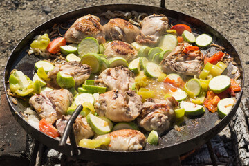 Preparation of Paella in the classic large pan