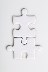 Fototapeta premium Blank puzzle pieces on a white background