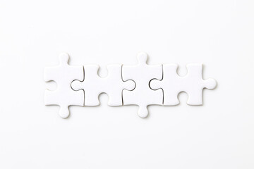Blank puzzle pieces on a white background