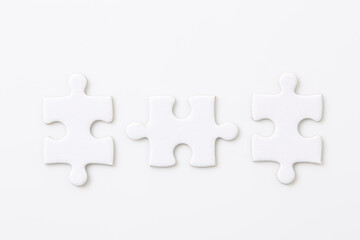 Blank three pieces of white puzzle on white background