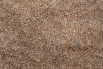 Brown background. Texture of stone, rocks. Decorative surface.