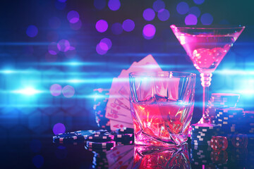 Alcohol drinks, dice, playing cards and casino chips on table against blurred lights. Straight poker combination © New Africa