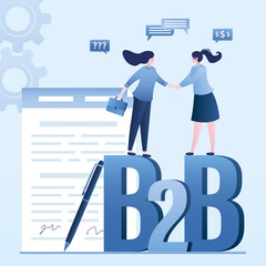 Businesswomen handshake, successful negotiations and agreement. b2b, business to business, concept. New startup, paper contract with signatures. Business women talking, profitable deal.