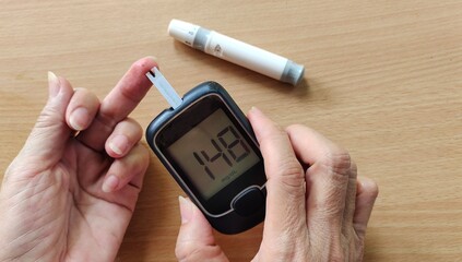 portrait showing blood pressure monitor of the patient.