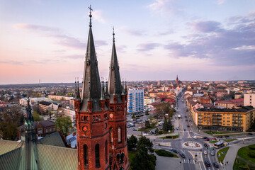 Holy Family Cathedral Church in Tarnow, Poland. Skyline of City Illuminated at Dusk. Cityscape and Architecture from Above.