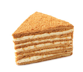 Slice of delicious layered honey cake isolated on white