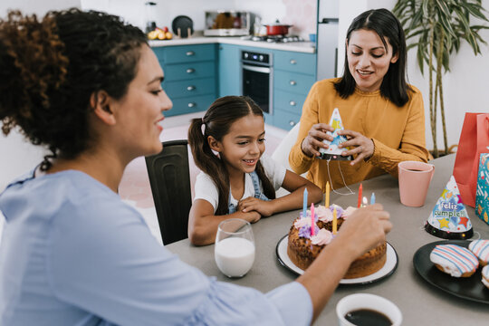 Hispanic Lgbtq Women Mother Family With Daughter Child Celebrating Happy Birthday At Home In Latin America