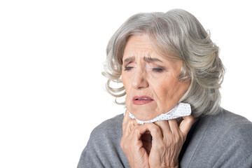 sad senior woman with toothache