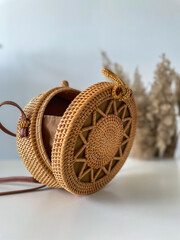 Open eco bag handmade from rattan on a white background