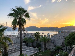 Fototapeta na wymiar On the wall of the castle of Marmaris in Turkey. Castle of Marmaris is one of the most attended places of the city.