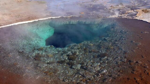 Impressive view of Icelands Geysir Geisir in the Golden Circule, the geothermal activity and a attraction for tourists in Iceland