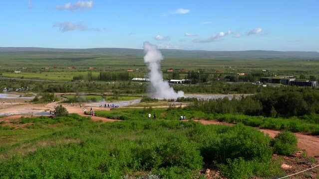Impressive view of Icelands Geysir Geisir in the Golden Circule, the geothermal activity and a attraction for tourists in Iceland