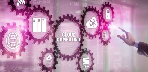 Obraz premium Cloud computing concept. Businessman is pressing on the virtual screen inscription Cloud computing